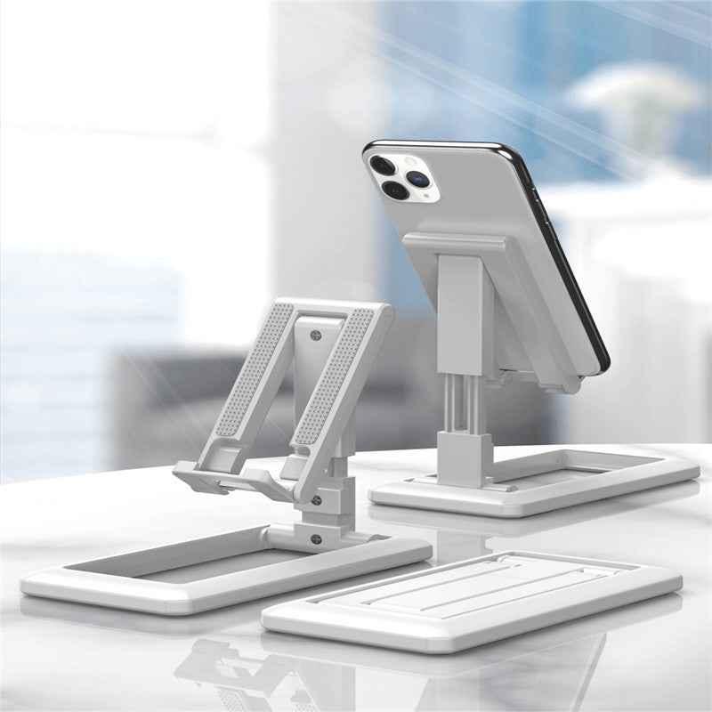 White and black retractable phone stands on wooden surface for web lessons