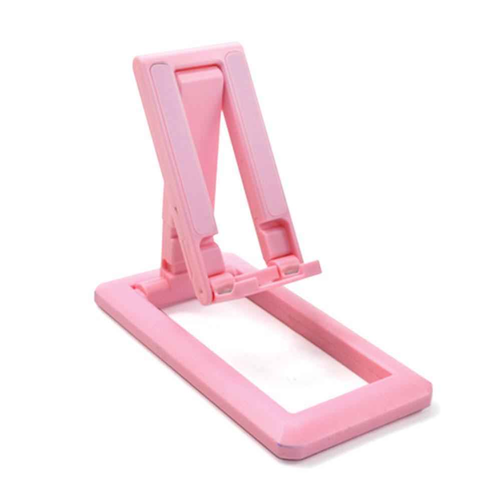 Pink foldable mobile phone holder for web lessons